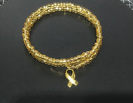 Childhood Cancer Awareness, gold seed Czech beads on memory wire with gold hope stamped ribbon. Shiny, easy to put on and take off. 