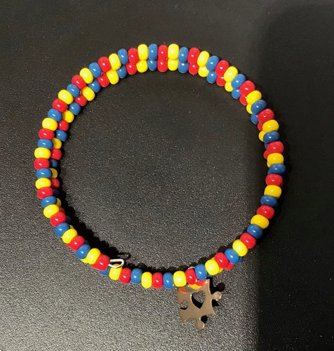 Autism Awareness red, yellow and blue Czech seed beads Beaded Bracelet with puzzle charm. Easy to put on and take off made with memory wire.