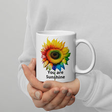 Load image into Gallery viewer, Rainbow Sunflower You Are Sunshine White glossy mug Fundraiser 10% will be split between Malan Syndrome and CHEO
