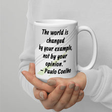 Load image into Gallery viewer, The world is changed by your example, not by your opinion.” – Paulo Coelho White glossy mug
